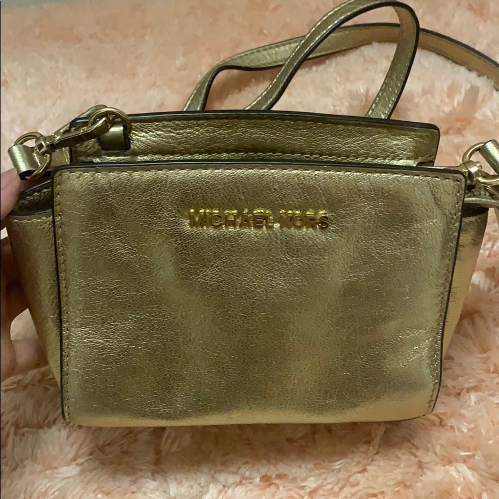 Micheal Kors small gold crossbody purse